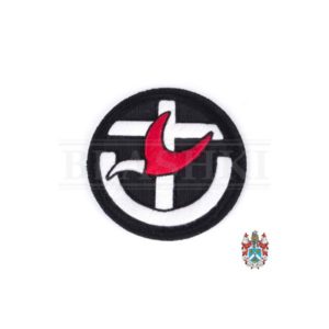 Image of a machine embroidered badge in the uniting church logo. Round badge in a dark background with a white cross in the centre and a white semicircle at the base. A red dove is in the centre of the badge.